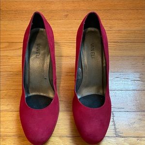 Red suede pumps